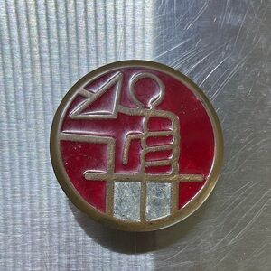 Vintage HellBoy Red and Gold Round belt buckle.